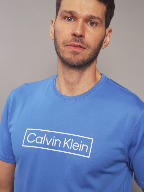 Чоловічий рашгард Calvin Klein футболка для купання із захистом від сонця UPF 40 1159858790 (Блакитний M)