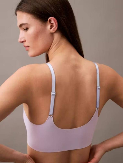 Безшовні трусики тонг Calvin Klein 1159838370 (бузковий M)