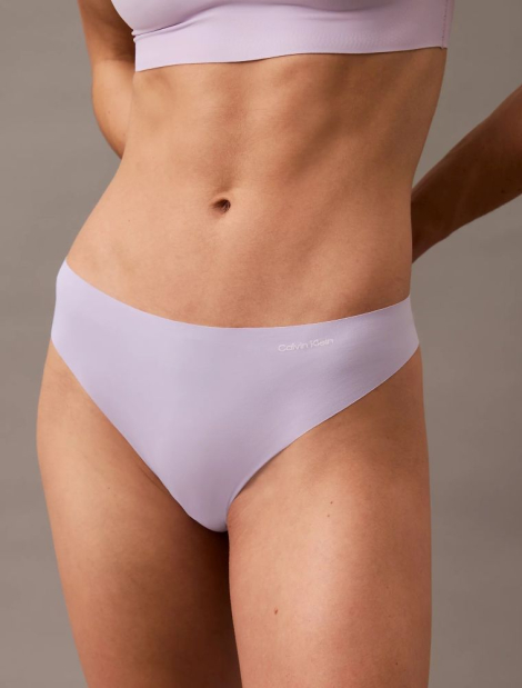 Безшовні трусики тонг Calvin Klein 1159838370 (бузковий M)