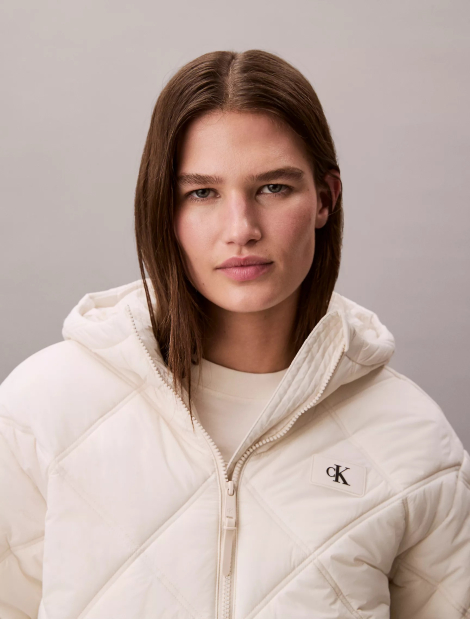 Жіноча стьобана куртка Calvin Klein 1159893467 (Молочний XL)