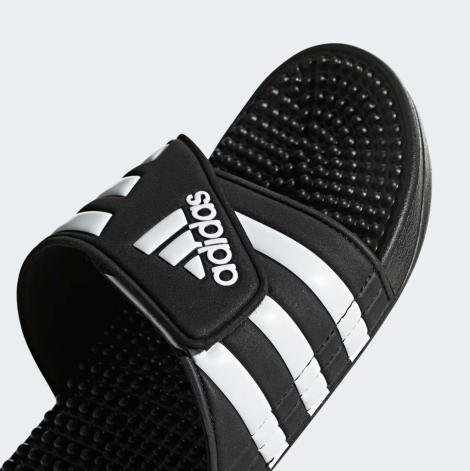 Легкие шлепанцы Adissage Slides Adidas с фирменным логотипом на липучке 50 (14 US) 32 см Черный 1159821731