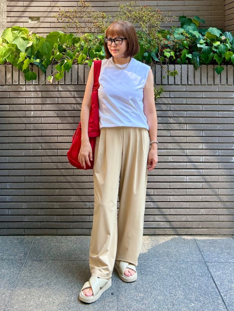 Женские эластичные брюки UNIQLO 1159851956 (Бежевый L)