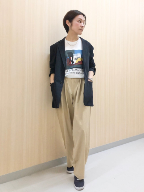 Женские эластичные брюки UNIQLO 1159851956 (Бежевый L)