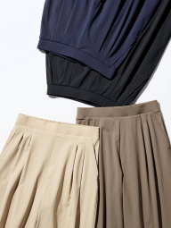 Женские эластичные брюки UNIQLO 1159851955 (Бежевый M)