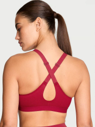 Спортивный топ Victoria's Secret VSX с перфорацией 1159862712 (Красный 36D)