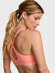 Спортивный топ Victoria's Secret VSX с перфорацией 1160280804 (Оранжевый 34C)