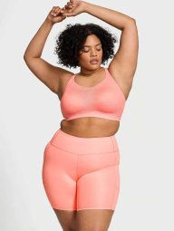 Спортивный топ Victoria's Secret VSX с перфорацией 1160280804 (Оранжевый 34C)