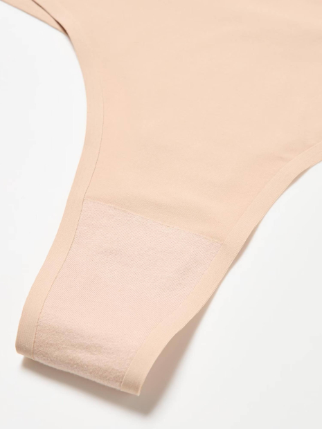 Жіночі безшовні трусики тонг Uniqlo з технологією AIRism 1159852992 (Бежевий XS)