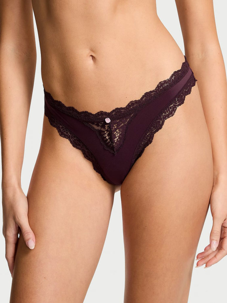 Женские гладкие трусики тонг Victoria's Secret с кружевом 1159861384 (Фиолетовый M)
