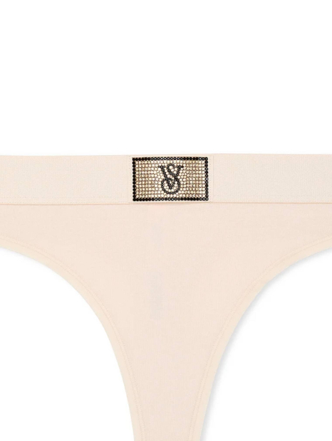 Женский комплект белья Victoria's Secret лиф и трусики тонг 1159833511 (Бежевый 36B/L)