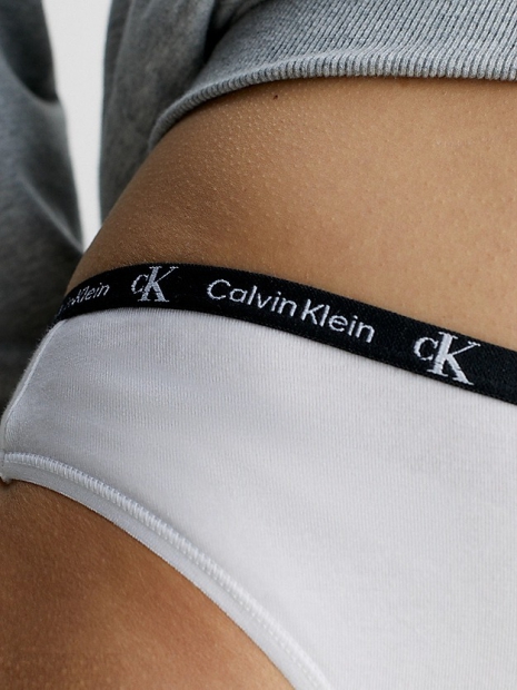 Набір 7 трусиків тонг Calvin Klein з логотипом. 1159808815 (Різнокольоровий, XS)