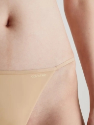 Женские гладкие трусики Calvin Klein стринги 1159816897 (Бежевый S)