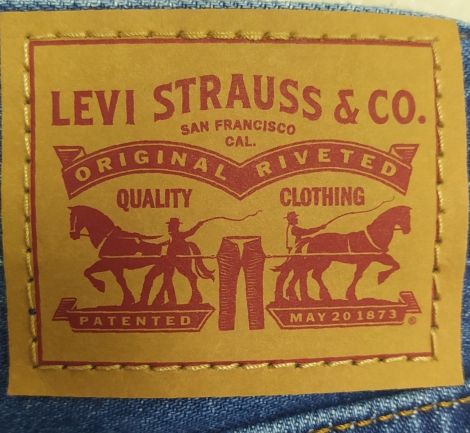 Женские джинсы Low Pro Levi's с рваными деталями 1159818215 (Синий 29)