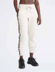 Женские спортивные штаны Calvin Klein джоггеры 1159777245 (Бежевый, XL)